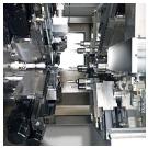 Двусторонний многошпиндельный токарный станок с числовым программным управлением